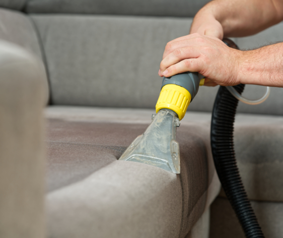 KODUKORISTUS 3 Sofa before and after wet - cleaning indoors. textile sofa vacuum cleaning. professional cleaning service concept.